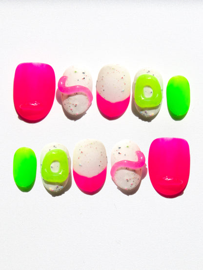 Set of colorful nail art designs on a white background